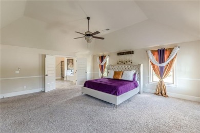 Discover this beautifully designed 4-sided brick home tucked on Crystal Lake Golf and Country Club in Georgia - for sale on GolfHomes.com, golf home, golf lot