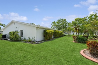 Welcome Home!  This spacious, beautifully updated Philodendron on Mainlands Golf Club in Florida - for sale on GolfHomes.com, golf home, golf lot