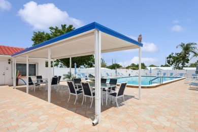 Welcome Home!  This spacious, beautifully updated Philodendron on Mainlands Golf Club in Florida - for sale on GolfHomes.com, golf home, golf lot