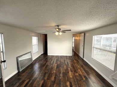 A charming home in the desirable Hidden Golf Community. Welcome on Lake Henry Golf Club in Florida - for sale on GolfHomes.com, golf home, golf lot
