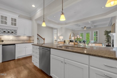 Discover luxury living in this stunning, end-unit townhome on on TPC at Wakefield Plantation in North Carolina - for sale on GolfHomes.com, golf home, golf lot