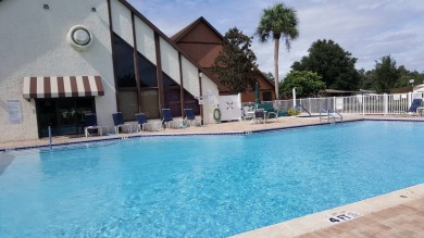 A charming home in the desirable Hidden Golf Community. Welcome on Lake Henry Golf Club in Florida - for sale on GolfHomes.com, golf home, golf lot