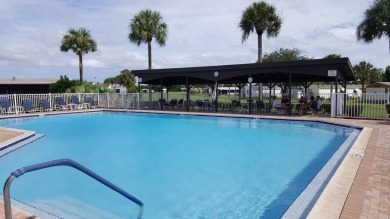 A charming home in the desirable Hidden Golf Community. Welcome on Lake Henry Golf Club in Florida - for sale on GolfHomes.com, golf home, golf lot