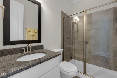 Discover luxury living in this stunning, end-unit townhome on on TPC at Wakefield Plantation in North Carolina - for sale on GolfHomes.com, golf home, golf lot