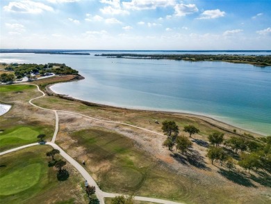 Welcome to your dream home! Nestled along the scenic fairways on Stewart Peninsula Golf Course in Texas - for sale on GolfHomes.com, golf home, golf lot