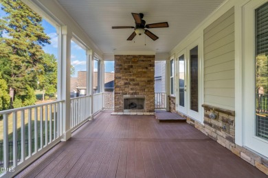 Discover luxury living in this stunning, end-unit townhome on on TPC at Wakefield Plantation in North Carolina - for sale on GolfHomes.com, golf home, golf lot