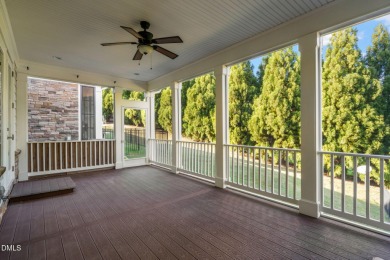 Discover luxury living in this stunning, end-unit townhome on on TPC at Wakefield Plantation in North Carolina - for sale on GolfHomes.com, golf home, golf lot
