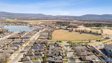 Enjoy the best in one-level comfort and convenience on a quiet on Hampton Cove Golf Course in Alabama - for sale on GolfHomes.com, golf home, golf lot