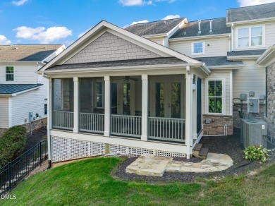 Discover luxury living in this stunning, end-unit townhome on on TPC at Wakefield Plantation in North Carolina - for sale on GolfHomes.com, golf home, golf lot