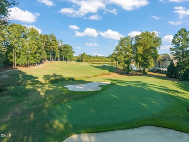 Discover luxury living in this stunning, end-unit townhome on on TPC at Wakefield Plantation in North Carolina - for sale on GolfHomes.com, golf home, golf lot