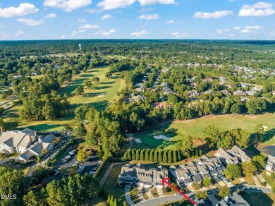 Discover luxury living in this stunning, end-unit townhome on on TPC at Wakefield Plantation in North Carolina - for sale on GolfHomes.com, golf home, golf lot