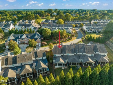 Discover luxury living in this stunning, end-unit townhome on on TPC at Wakefield Plantation in North Carolina - for sale on GolfHomes.com, golf home, golf lot