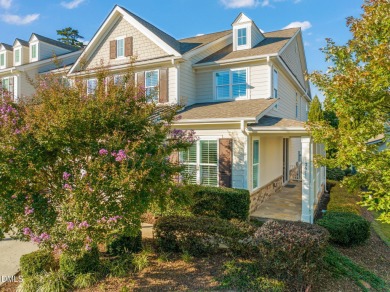 Discover luxury living in this stunning, end-unit townhome on on TPC at Wakefield Plantation in North Carolina - for sale on GolfHomes.com, golf home, golf lot