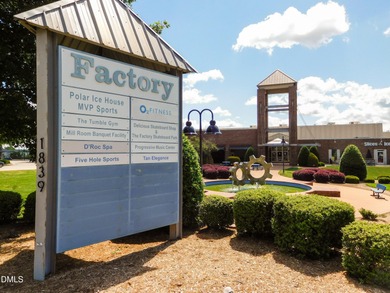 Discover luxury living in this stunning, end-unit townhome on on TPC at Wakefield Plantation in North Carolina - for sale on GolfHomes.com, golf home, golf lot
