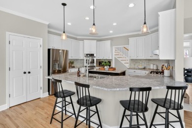 This beautifully maintained home in the Gleneagles neighborhood on The Golf Club of Georgia in Georgia - for sale on GolfHomes.com, golf home, golf lot