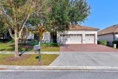 Want to live like you've retired to the house of your dreams on The Oasis Club at Champions Gate in Florida - for sale on GolfHomes.com, golf home, golf lot