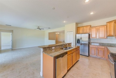 Want to live like you've retired to the house of your dreams on The Oasis Club at Champions Gate in Florida - for sale on GolfHomes.com, golf home, golf lot