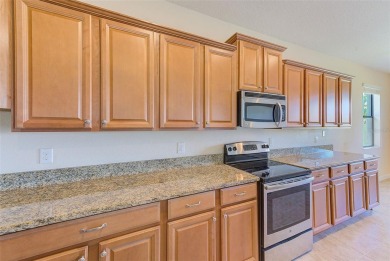 Want to live like you've retired to the house of your dreams on The Oasis Club at Champions Gate in Florida - for sale on GolfHomes.com, golf home, golf lot