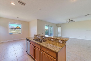Want to live like you've retired to the house of your dreams on The Oasis Club at Champions Gate in Florida - for sale on GolfHomes.com, golf home, golf lot