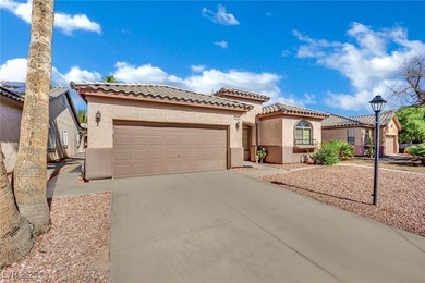 This beautiful home is located in a guard-gated community with on Stallion Mountain Golf Course in Nevada - for sale on GolfHomes.com, golf home, golf lot