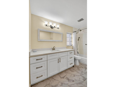 Don't just View & Save it -- come see it. The pictures don't on Atlantis Golf Club in Florida - for sale on GolfHomes.com, golf home, golf lot