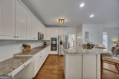 Welcome to your dream home in the highly coveted, resort-style on Towne Lake Hills Golf Club in Georgia - for sale on GolfHomes.com, golf home, golf lot
