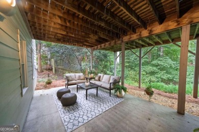 Welcome to your dream home in the highly coveted, resort-style on Towne Lake Hills Golf Club in Georgia - for sale on GolfHomes.com, golf home, golf lot
