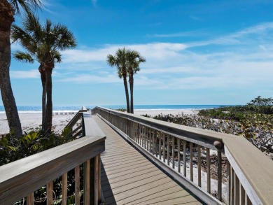 Experience beachfront luxury in this spacious 3,800-square-foot on Longboat Key Golf Club Resort in Florida - for sale on GolfHomes.com, golf home, golf lot