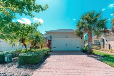 Move-in ready Avellino model, featuring a Courtyard entry to on Stonegate Golf Club in Florida - for sale on GolfHomes.com, golf home, golf lot