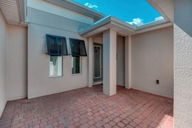 Move-in ready Avellino model, featuring a Courtyard entry to on Stonegate Golf Club in Florida - for sale on GolfHomes.com, golf home, golf lot