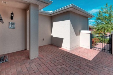 Move-in ready Avellino model, featuring a Courtyard entry to on Stonegate Golf Club in Florida - for sale on GolfHomes.com, golf home, golf lot