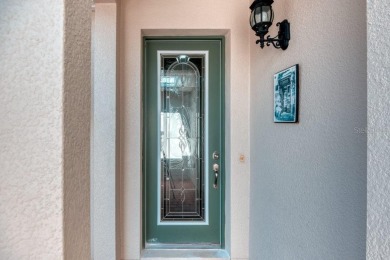 Move-in ready Avellino model, featuring a Courtyard entry to on Stonegate Golf Club in Florida - for sale on GolfHomes.com, golf home, golf lot