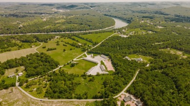 Nestled in one of the most sought-after gated subdivisions, this on Woodson Bend Resort in Kentucky - for sale on GolfHomes.com, golf home, golf lot