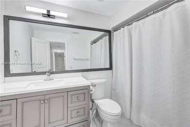 Nestled on a spectacular, tree-lined site in a quiet, low on Orangebrook Golf and Country Club in Florida - for sale on GolfHomes.com, golf home, golf lot