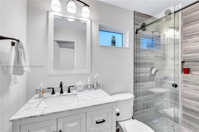 Nestled on a spectacular, tree-lined site in a quiet, low on Orangebrook Golf and Country Club in Florida - for sale on GolfHomes.com, golf home, golf lot