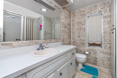 Double Wide Manufactured Home available in Largo, FL - Active on Palm Hill Golf Club in Florida - for sale on GolfHomes.com, golf home, golf lot