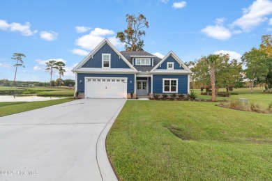 This brand new Riptide home with stunning setting and finishes on Sea Trail Golf Resort in North Carolina - for sale on GolfHomes.com, golf home, golf lot