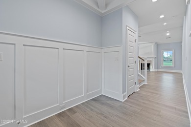 This brand new Riptide home with stunning setting and finishes on Sea Trail Golf Resort in North Carolina - for sale on GolfHomes.com, golf home, golf lot