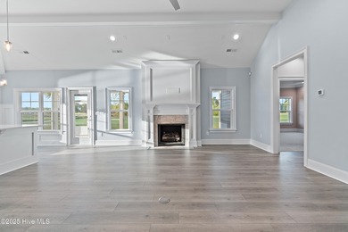 This brand new Riptide home with stunning setting and finishes on Sea Trail Golf Resort in North Carolina - for sale on GolfHomes.com, golf home, golf lot