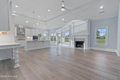 This brand new Riptide home with stunning setting and finishes on Sea Trail Golf Resort in North Carolina - for sale on GolfHomes.com, golf home, golf lot