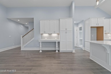 This brand new Riptide home with stunning setting and finishes on Sea Trail Golf Resort in North Carolina - for sale on GolfHomes.com, golf home, golf lot