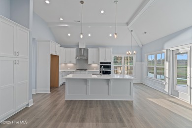 This brand new Riptide home with stunning setting and finishes on Sea Trail Golf Resort in North Carolina - for sale on GolfHomes.com, golf home, golf lot