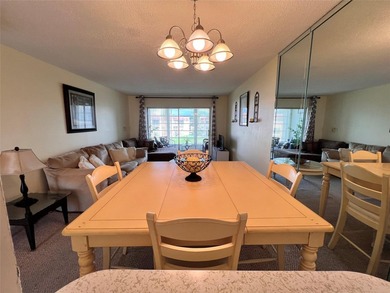 Charming 1/1 furnished or unfurnished condo in the heart of on Sunrise Lakes Phase III in Florida - for sale on GolfHomes.com, golf home, golf lot