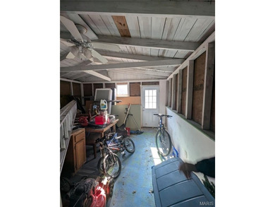 Nestled on a quiet, well-manicured street in the charming town on Normandie Golf Club in Missouri - for sale on GolfHomes.com, golf home, golf lot