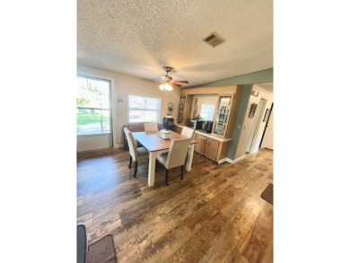 This stunning two-bedroom, two-bathroom home in Pine Lakes on Pine Lakes Country Club in Florida - for sale on GolfHomes.com, golf home, golf lot