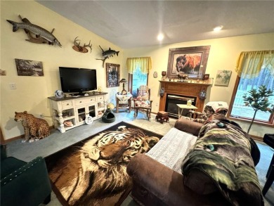 Discover the charm of this enchanting country home in Park on Headwaters Country Club in Minnesota - for sale on GolfHomes.com, golf home, golf lot