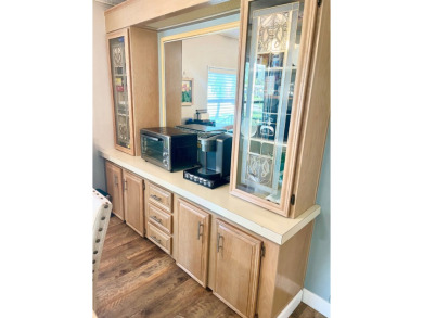This stunning two-bedroom, two-bathroom home in Pine Lakes on Pine Lakes Country Club in Florida - for sale on GolfHomes.com, golf home, golf lot