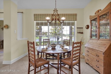 This elegant David Weekley home offers panoramic water views on The Palencia Club in Florida - for sale on GolfHomes.com, golf home, golf lot