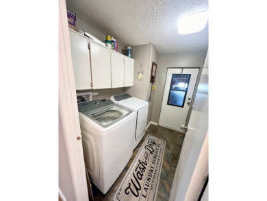 This stunning two-bedroom, two-bathroom home in Pine Lakes on Pine Lakes Country Club in Florida - for sale on GolfHomes.com, golf home, golf lot