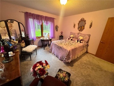 Discover the charm of this enchanting country home in Park on Headwaters Country Club in Minnesota - for sale on GolfHomes.com, golf home, golf lot